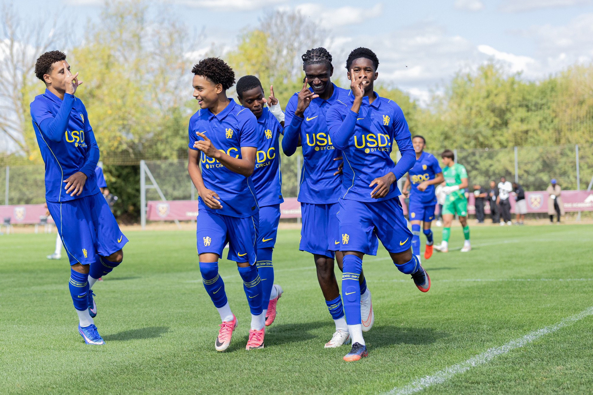 Chelsea academy players celebrating together