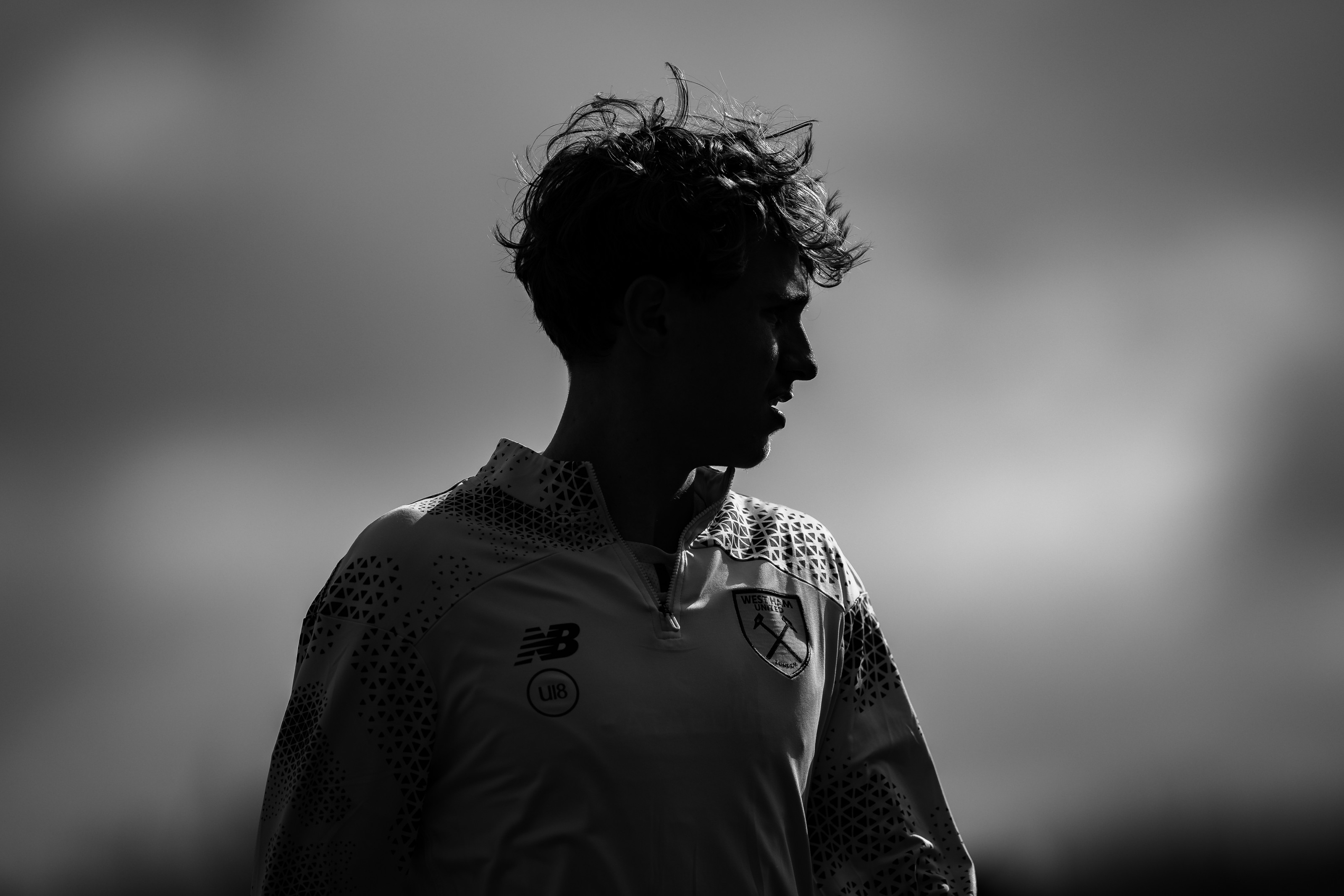 West Ham U18 player in silhouette, black and white